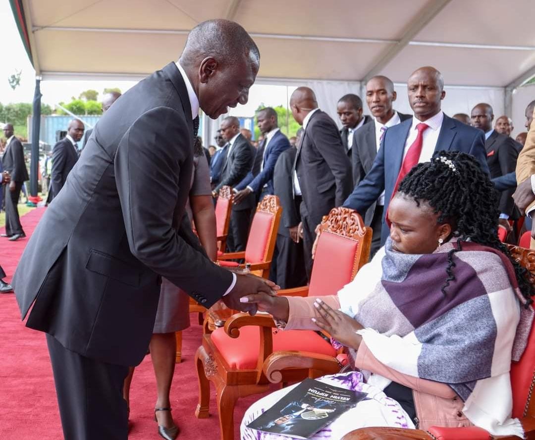 President William Ruto with Kelvin Kiptum's wife Asenath Rotich.